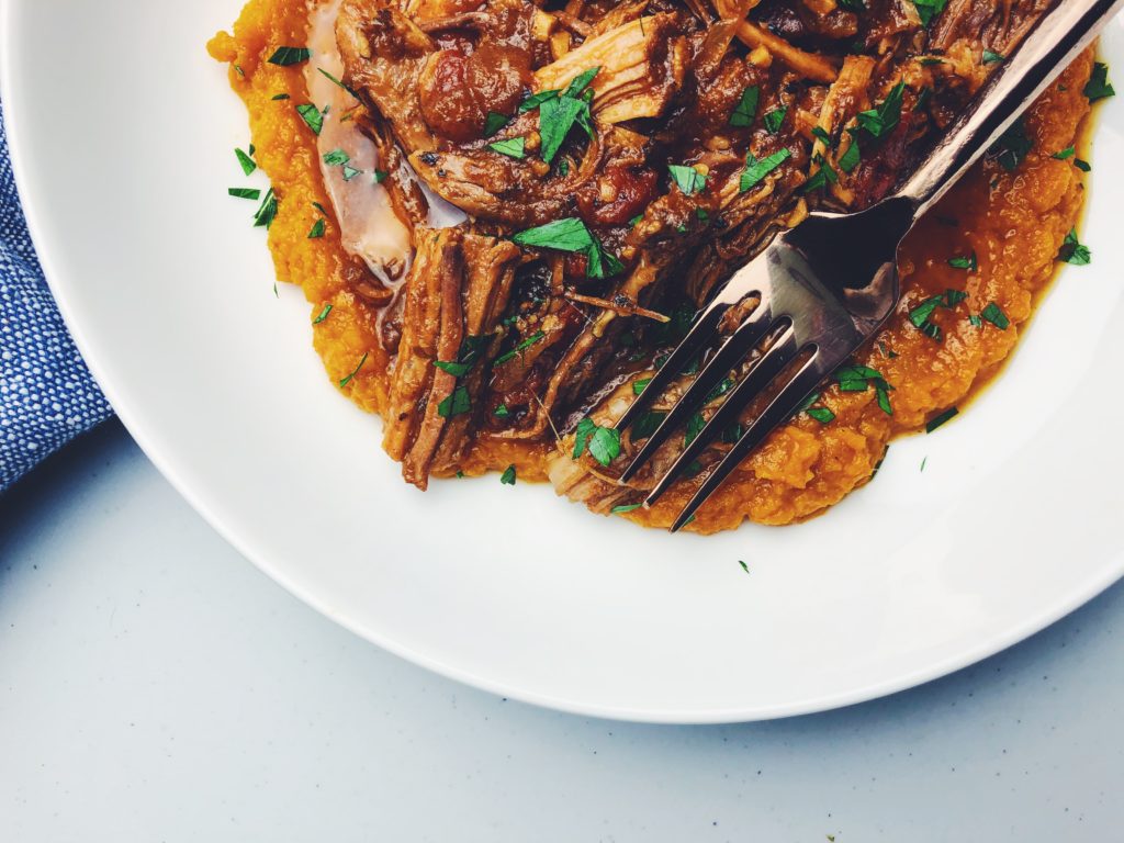 Braised Pork Shoulder Roast, shredded and served with a puree of sweet potato and carrots