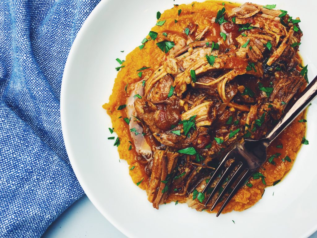 Braised Pork Shoulder Roast, shredded and served with a puree of sweet potato and carrots