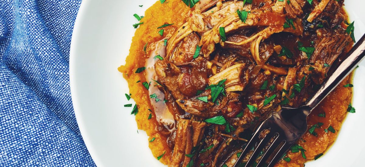 Braised Pork Shoulder Roast, shredded and served with a puree of sweet potato and carrots