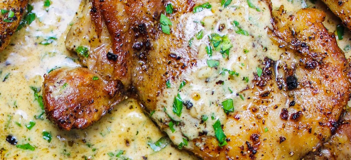 chicken thighs in a creamy herb sauce